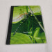 pond journal a4 hardback lined notebook gold ringed dragonfly front cover slight angle view